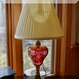 DL10. Pair of ruby cut to clear glass lamps with marble bases and matching glass finials.